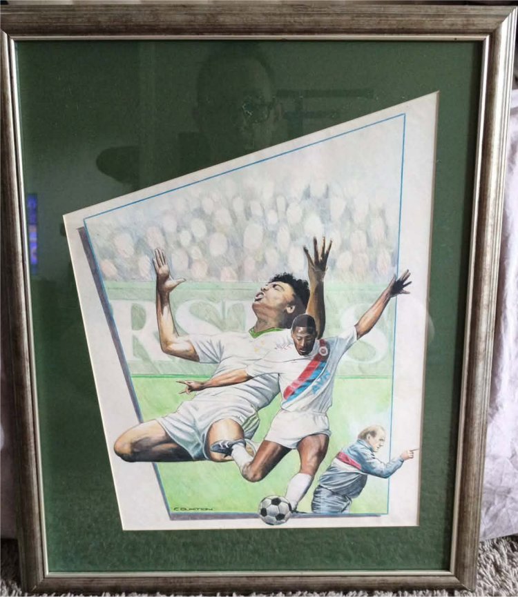 The genuine original Kick Off 2 cover illustration, framed and signed by Cameron Buxton, photographed in Stainy's possession.