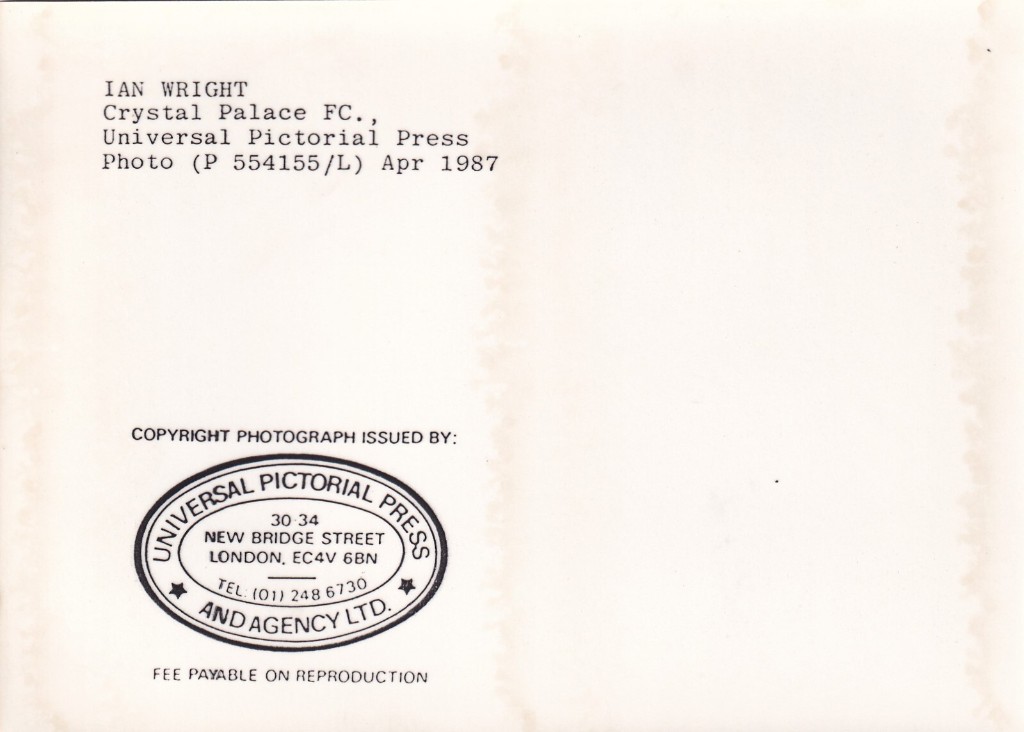 The back of the press photo with a Universal Pictorial Press stamp, labelled Ian Wright, Crystal Palace, April 1987.
